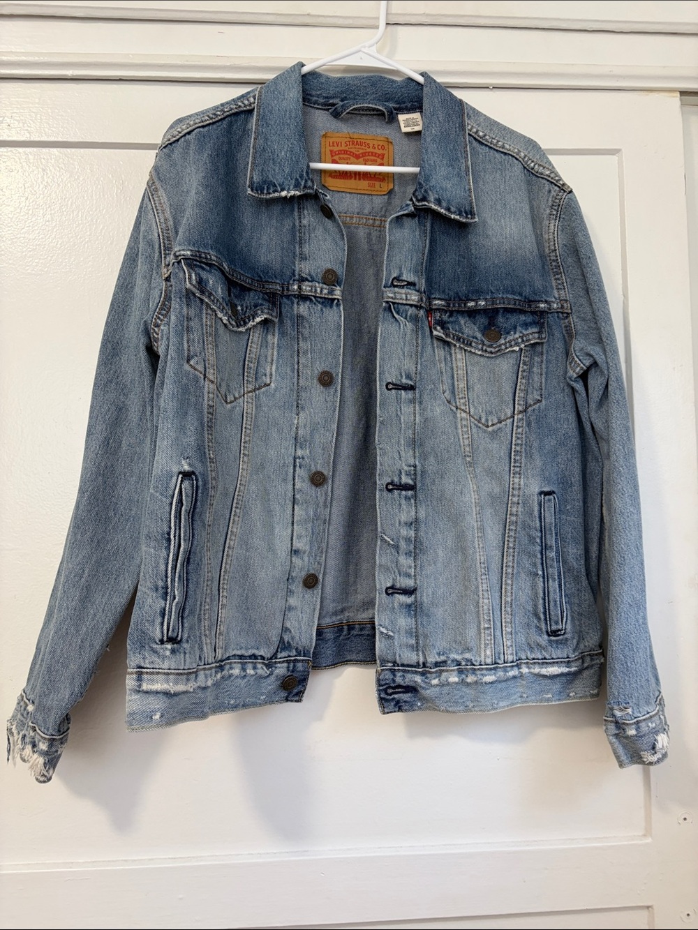 Levi's Light Blue Distressed Denim Trucker Jacket